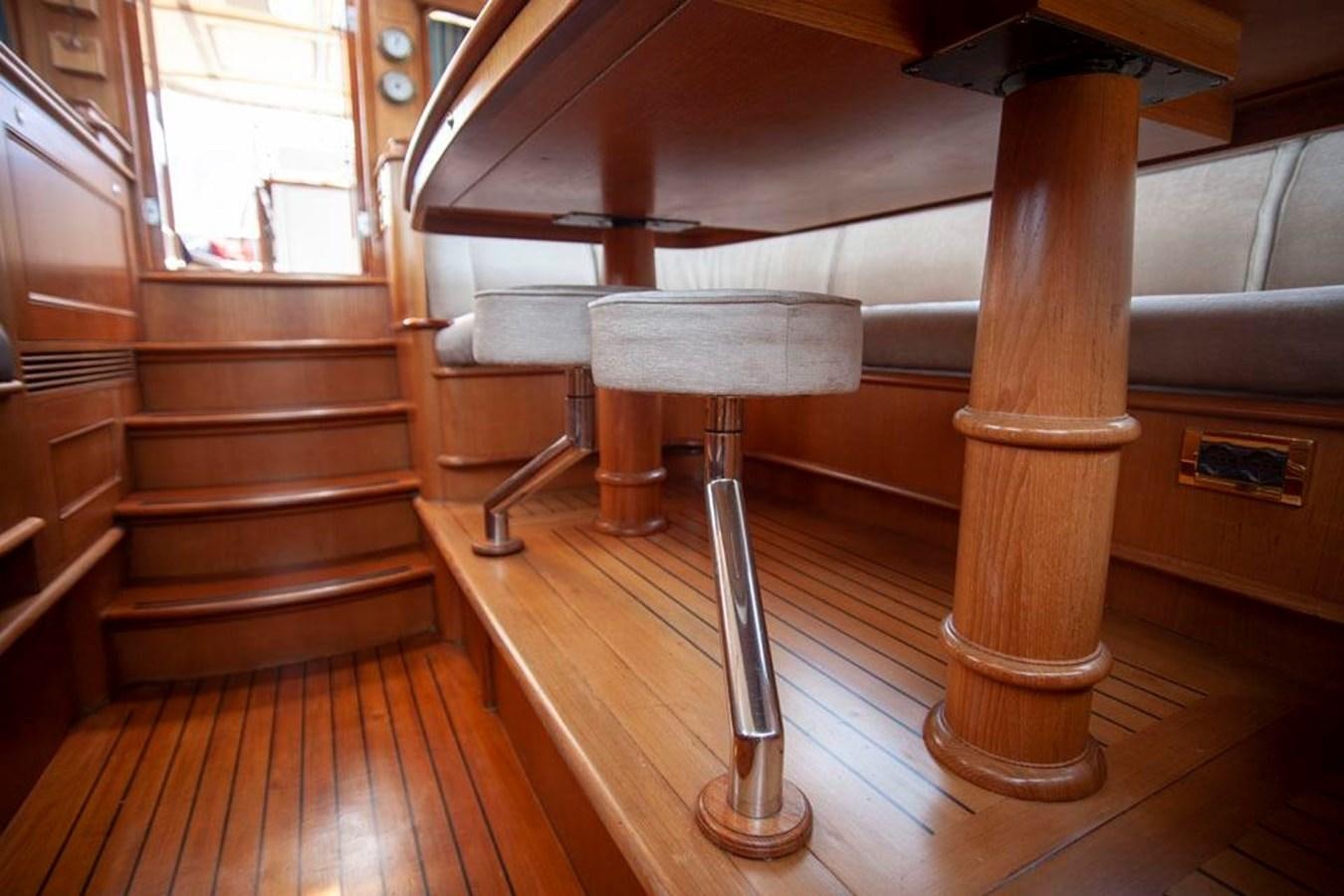 a wooden staircase with a wood floor aboard SWEET EMOTION Yacht for Sale