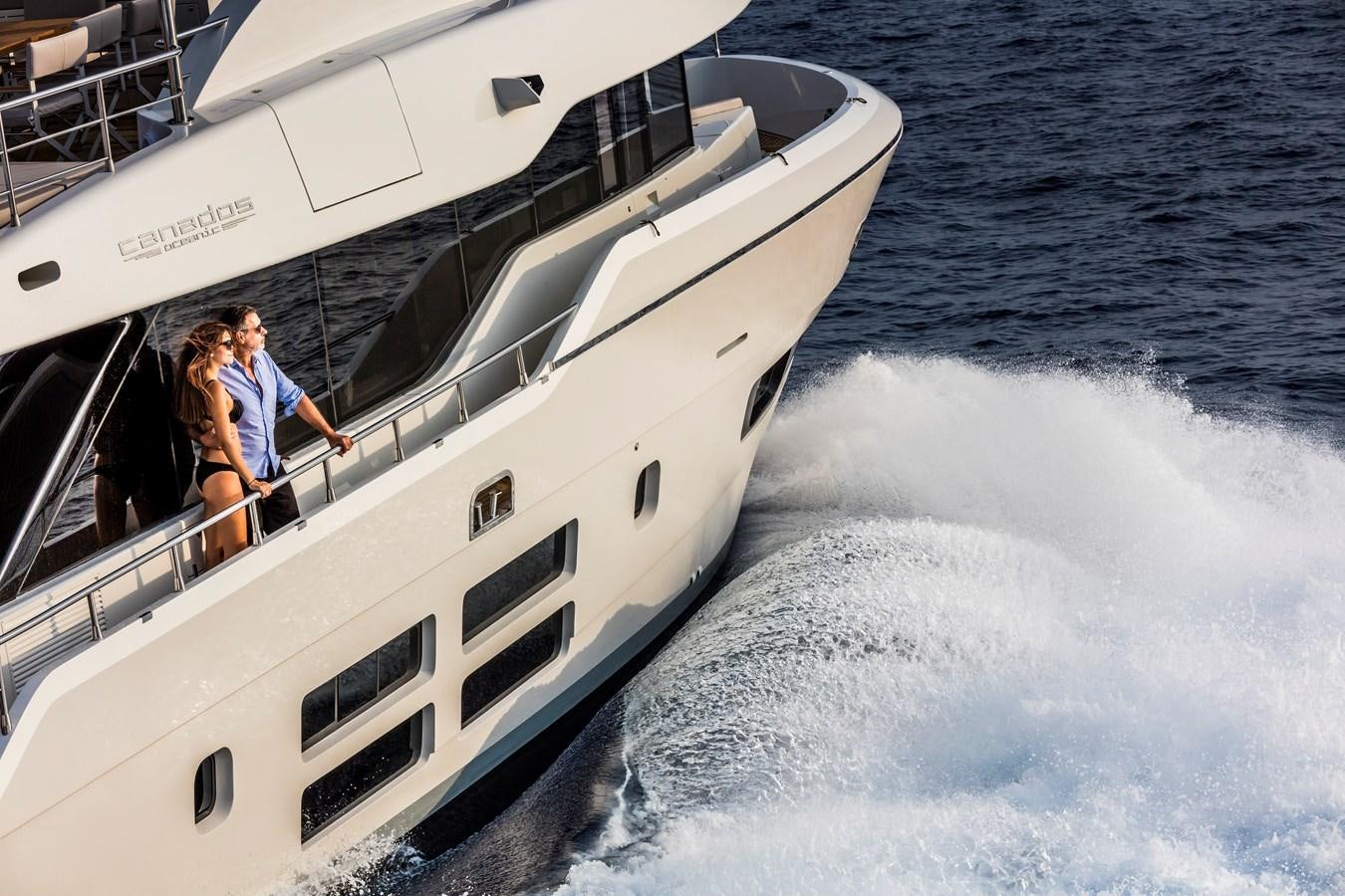 a couple people on a boat aboard NEW OCEANIC 76/81 GT Yacht for Sale