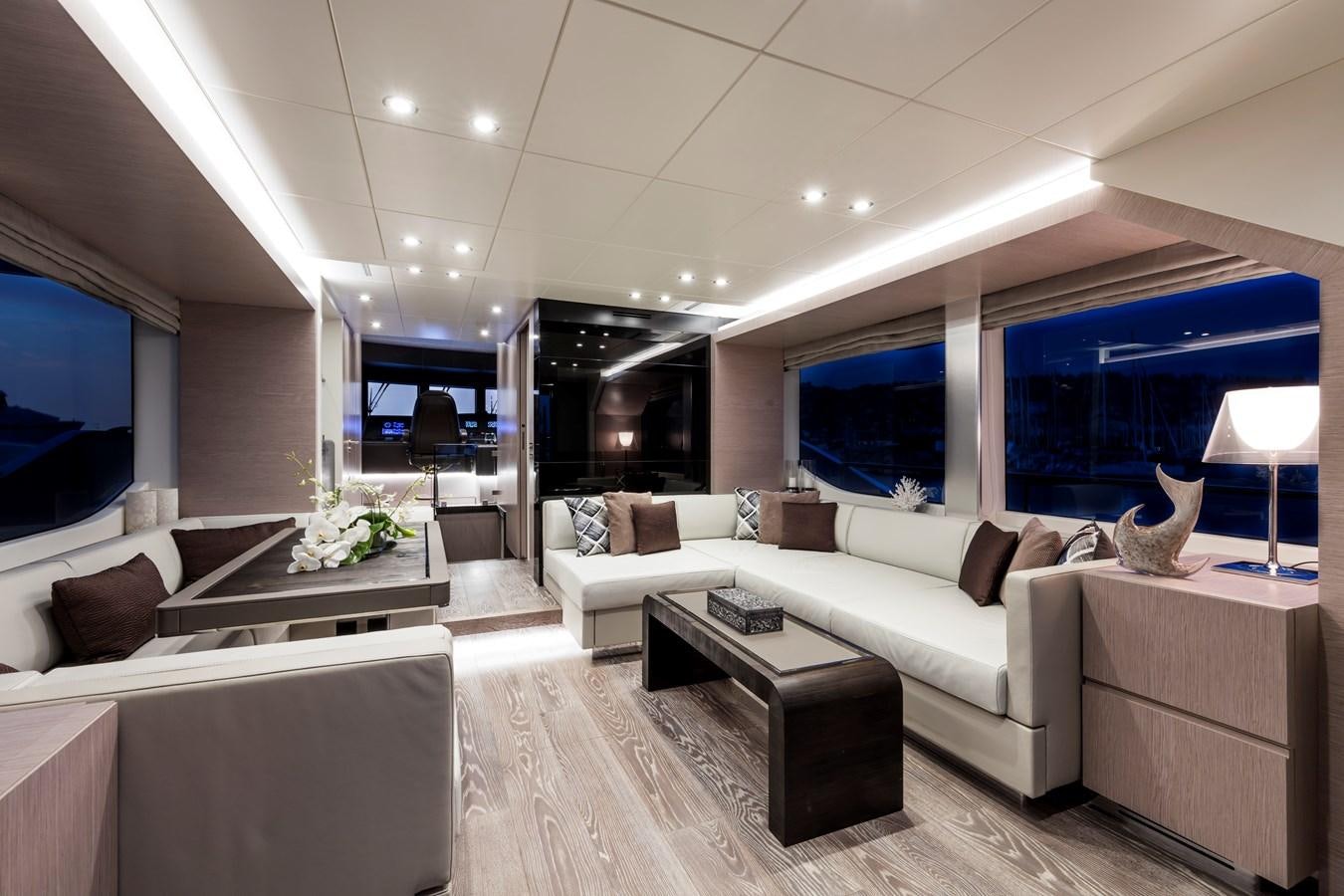 a living room with a large window aboard NEW OCEANIC 76/81 GT Yacht for Sale