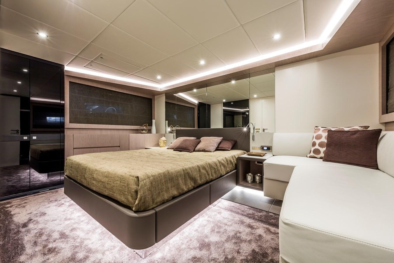 a room with a bed and a tv aboard NEW OCEANIC 76/81 GT Yacht for Sale