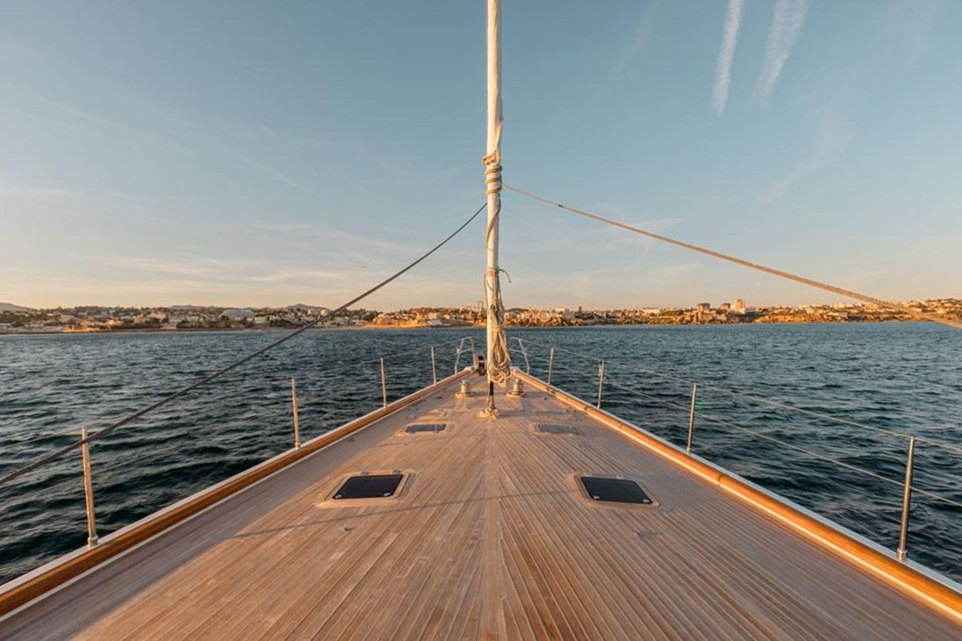 a wooden dock over water aboard PAULINE AF SKANOR Yacht for Sale