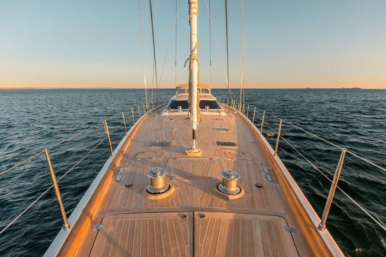a wooden boat on the water aboard PAULINE AF SKANOR Yacht for Sale