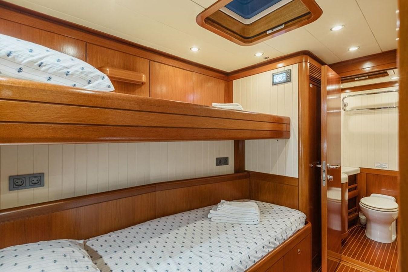 a large bathroom with a large bed aboard PAULINE AF SKANOR Yacht for Sale