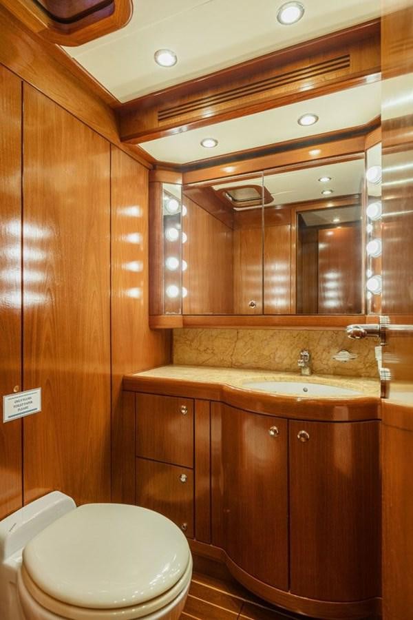 a bathroom with a sink and a toilet aboard PAULINE AF SKANOR Yacht for Sale