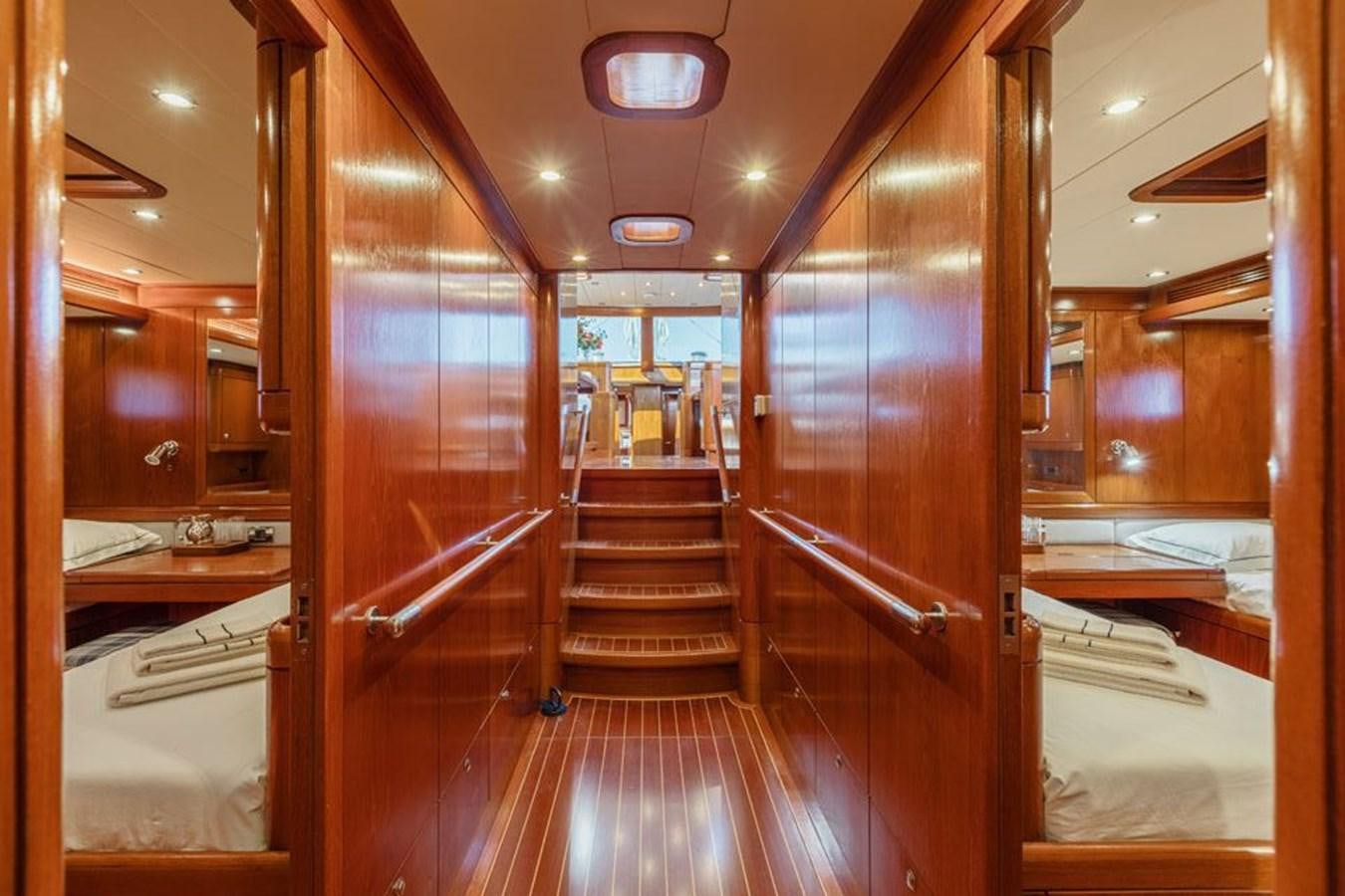 a wooden room with wooden doors aboard PAULINE AF SKANOR Yacht for Sale