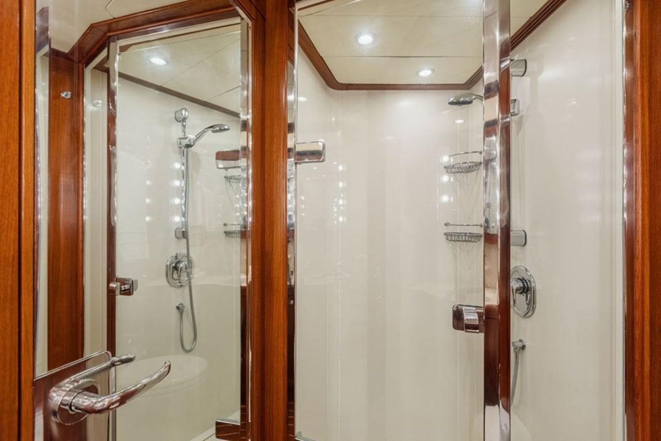 a bathroom with a glass shower aboard PAULINE AF SKANOR Yacht for Sale