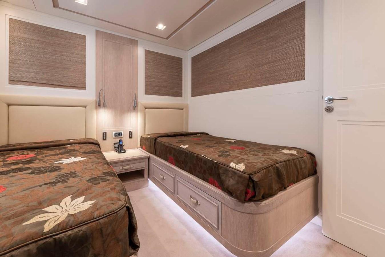 a bedroom with a bed aboard CHRISTINA Yacht for Sale