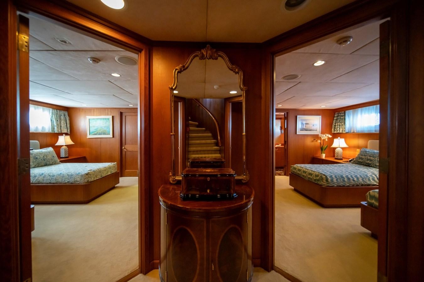 a living room with a piano aboard SEA FALCON II Yacht for Sale