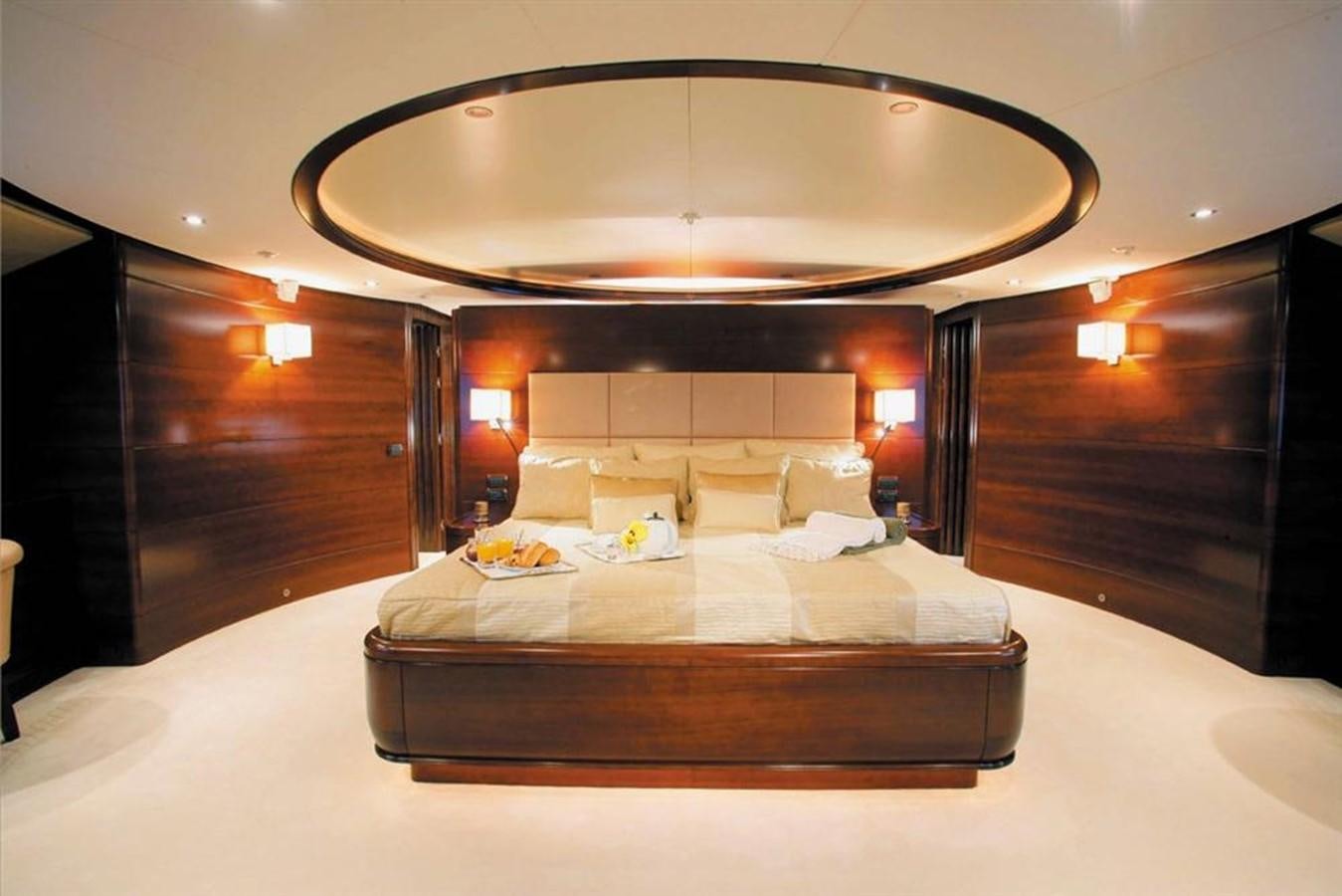 a bed with a round ceiling aboard SEASCAPE V Yacht for Sale