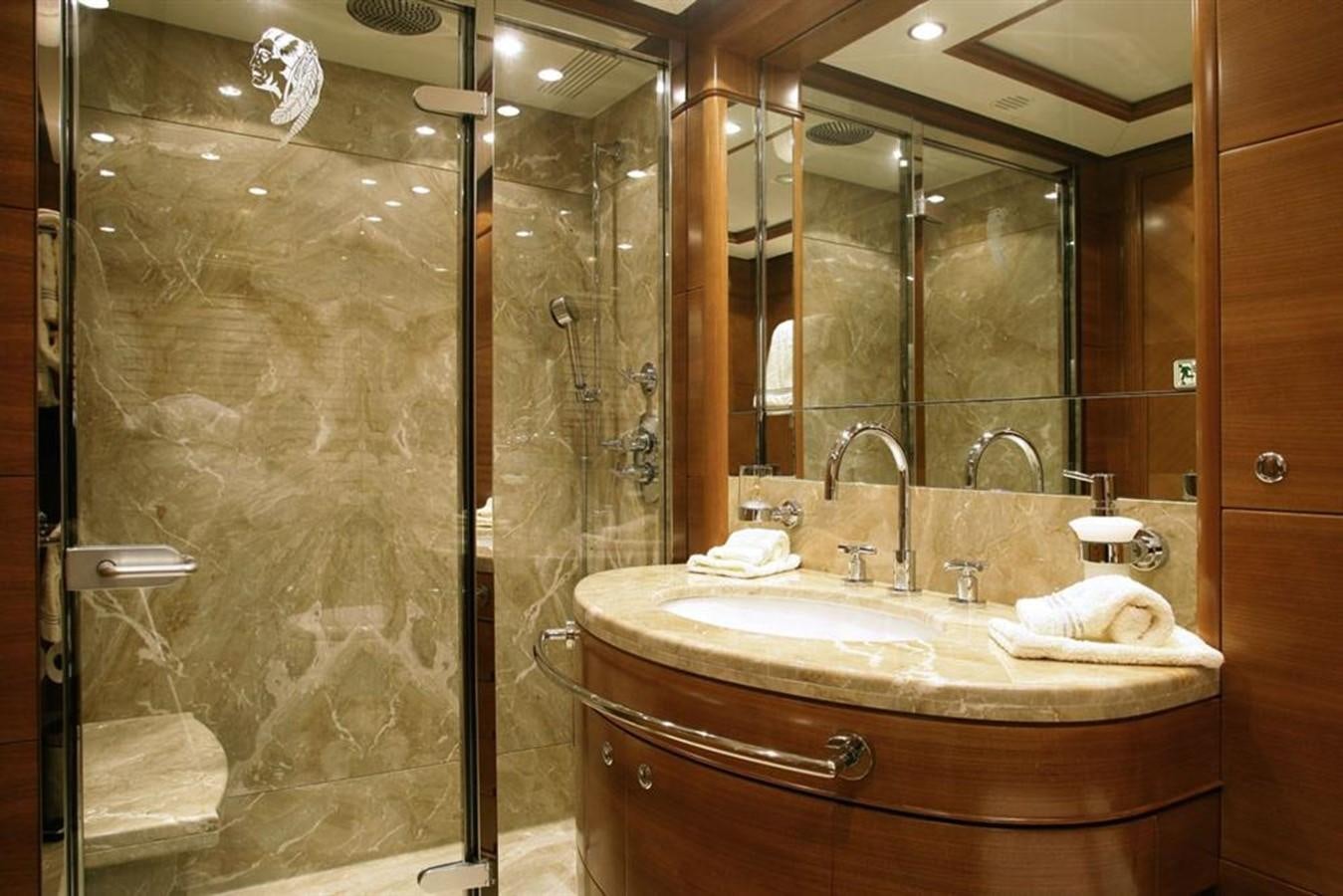 a bathroom with a large mirror aboard SEASCAPE V Yacht for Sale