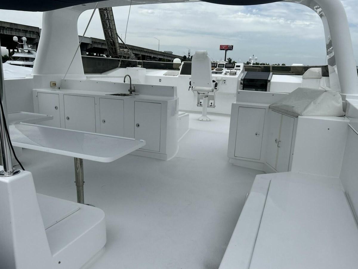 a room with white cabinets and white shelves aboard MARGAUX Yacht for Sale