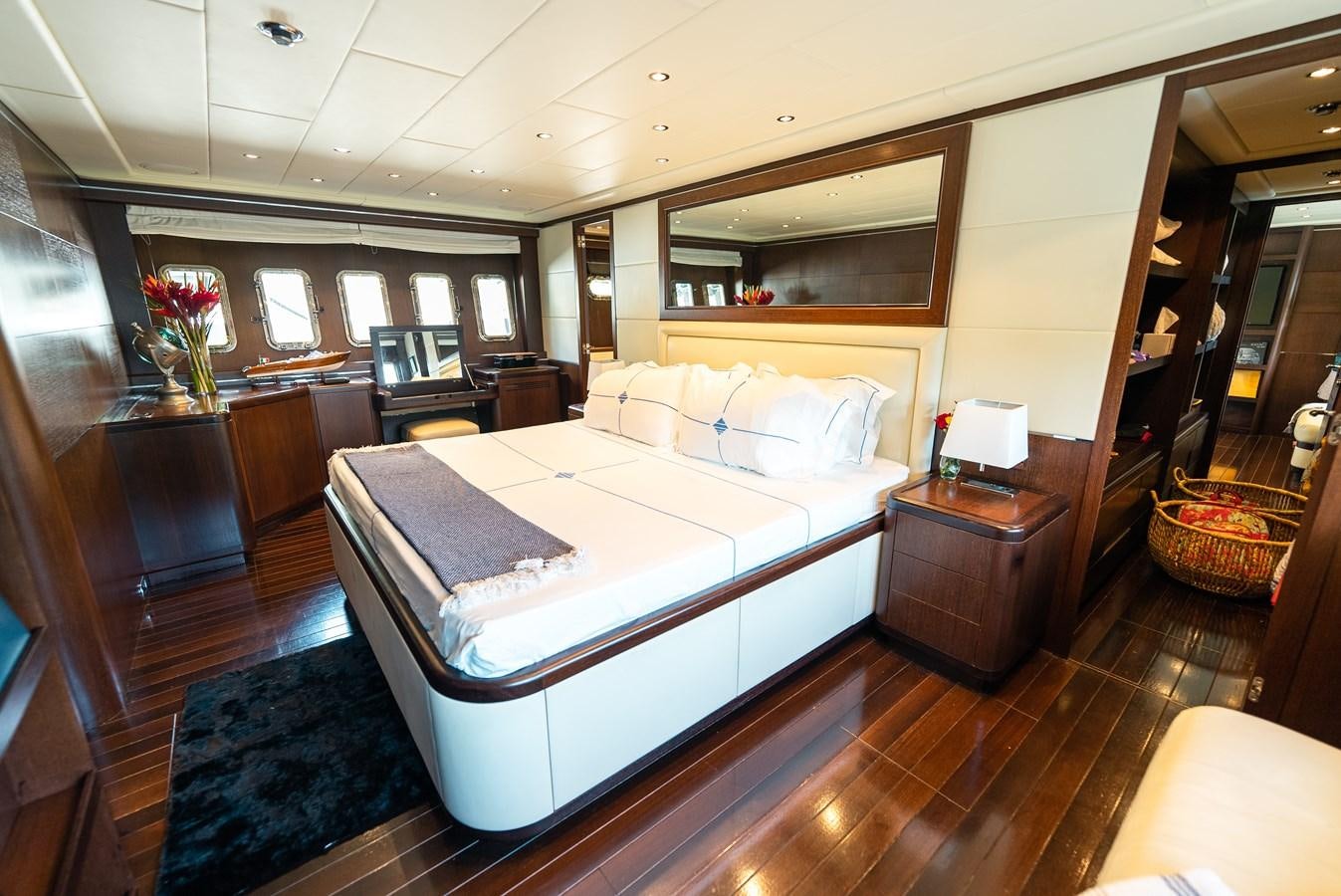 a large bedroom with a large bed aboard SCRATCH Yacht for Sale