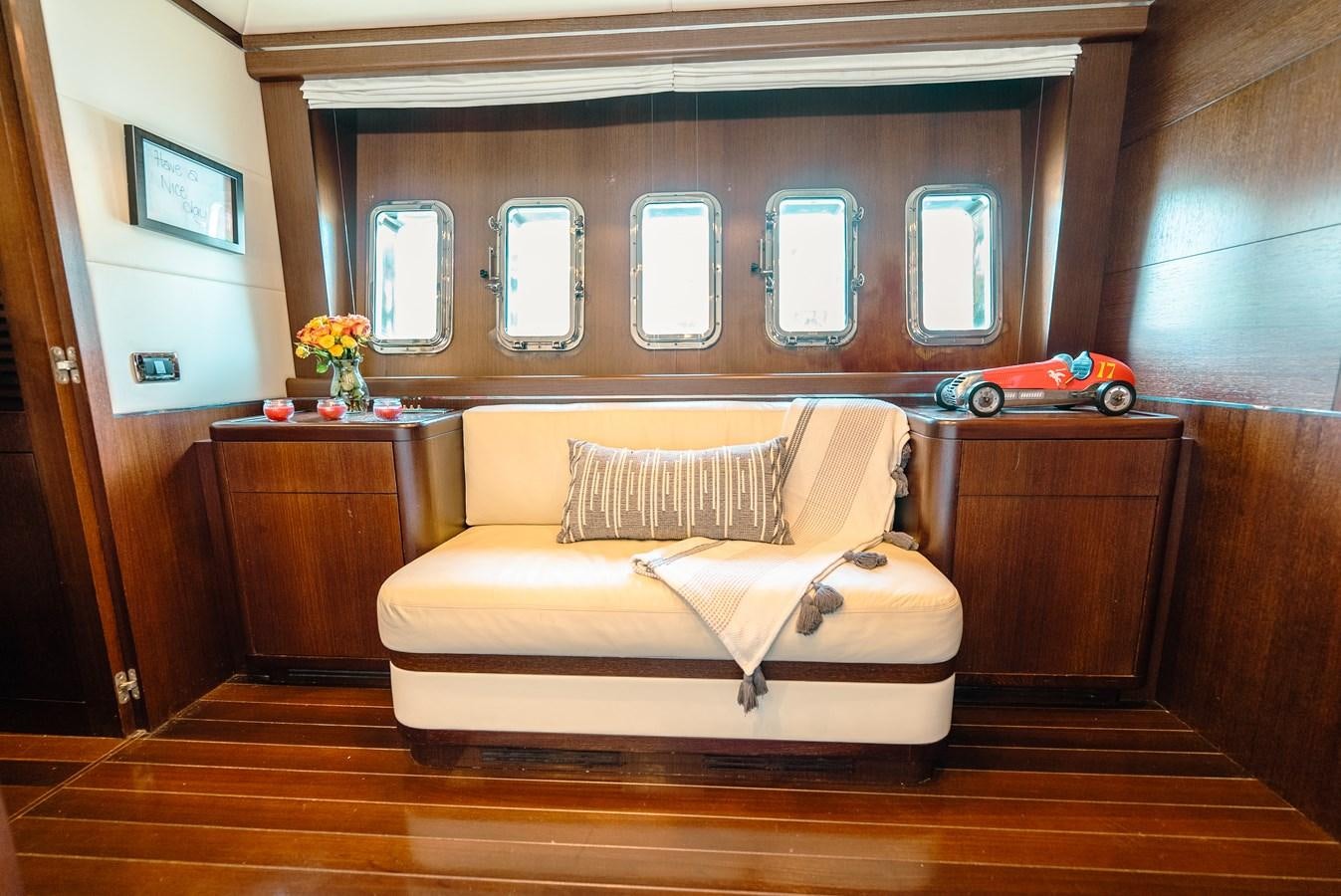 a living room with a couch aboard SCRATCH Yacht for Sale