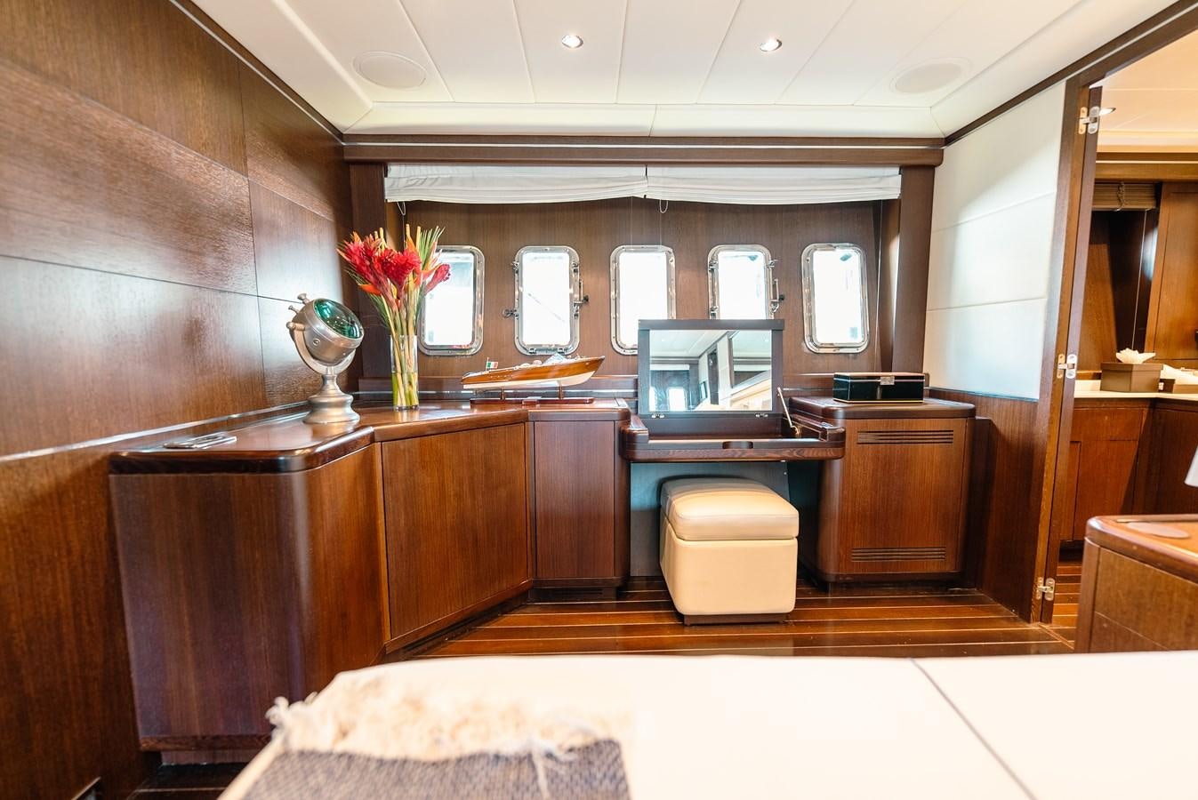 a kitchen with a large island aboard SCRATCH Yacht for Sale