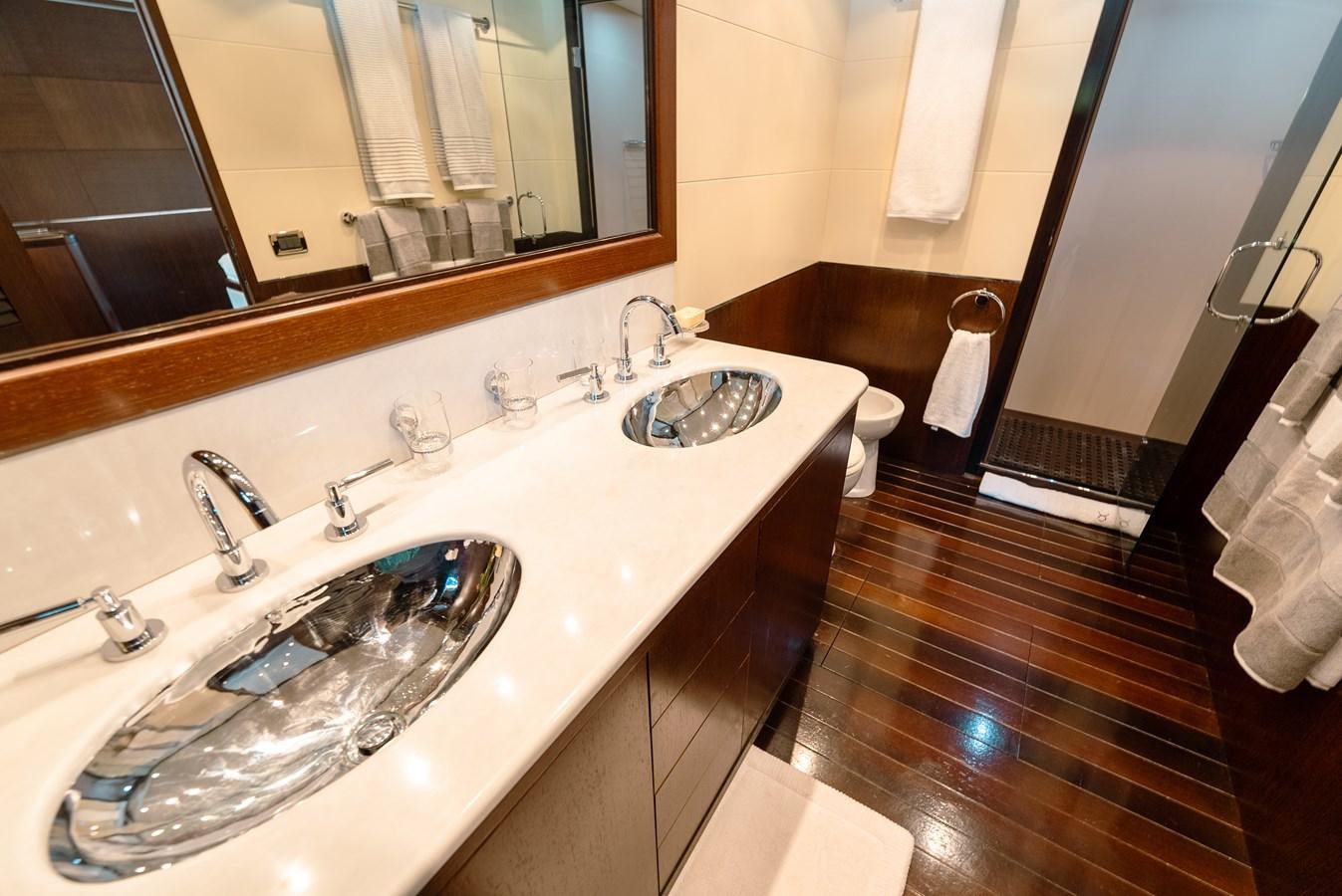 a bathroom with a large countertop aboard SCRATCH Yacht for Sale