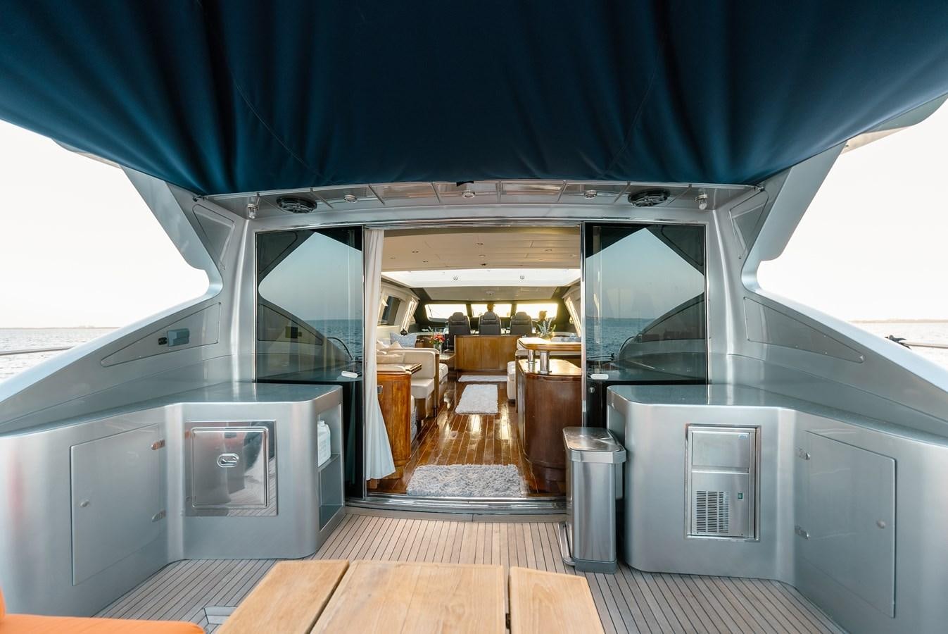 a large kitchen with a large open door aboard SCRATCH Yacht for Sale