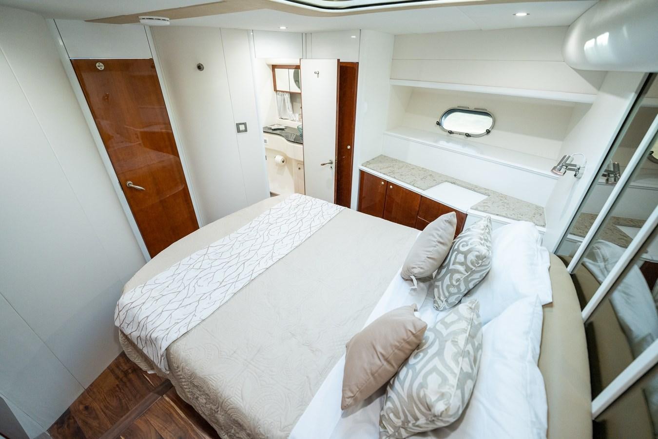 a couple of beds in a room aboard 70 Yacht for Sale