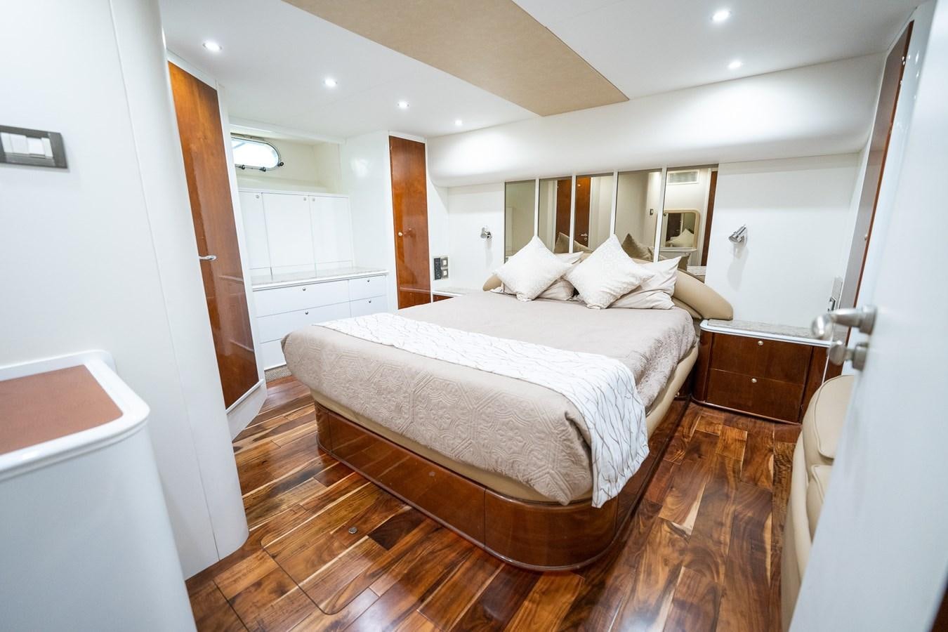 a large bedroom with a large bed aboard 70 Yacht for Sale