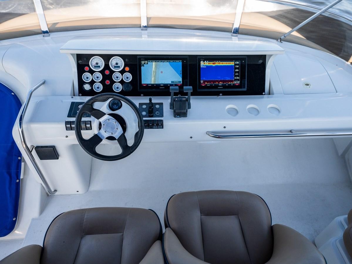 the inside of a car aboard 70 Yacht for Sale