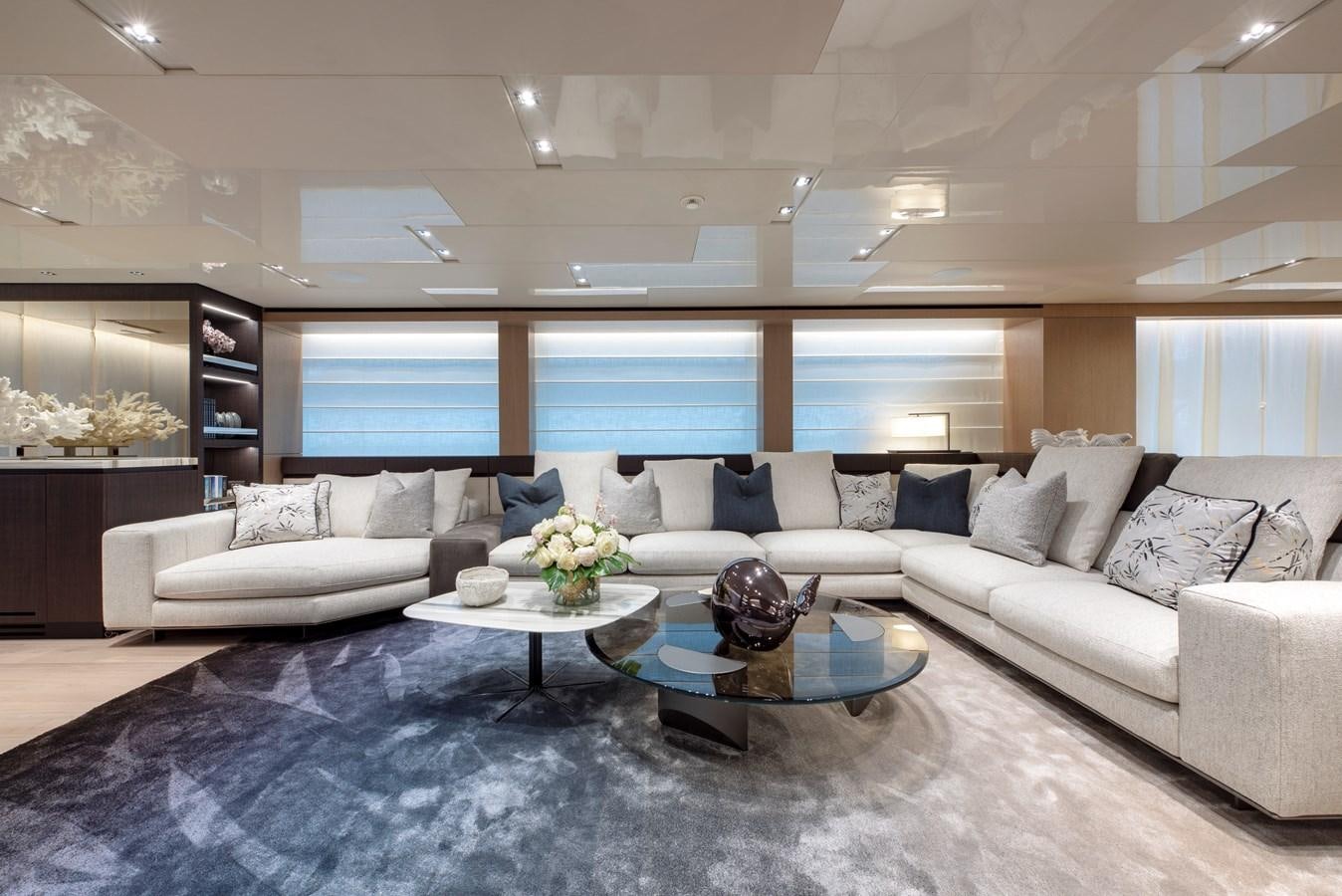 a living room with a large window aboard INSIEME Yacht for Sale
