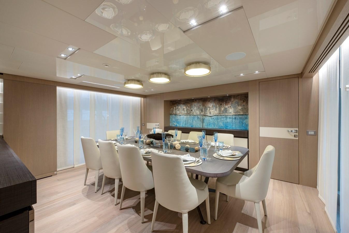 a large conference room with tables and chairs aboard INSIEME Yacht for Sale