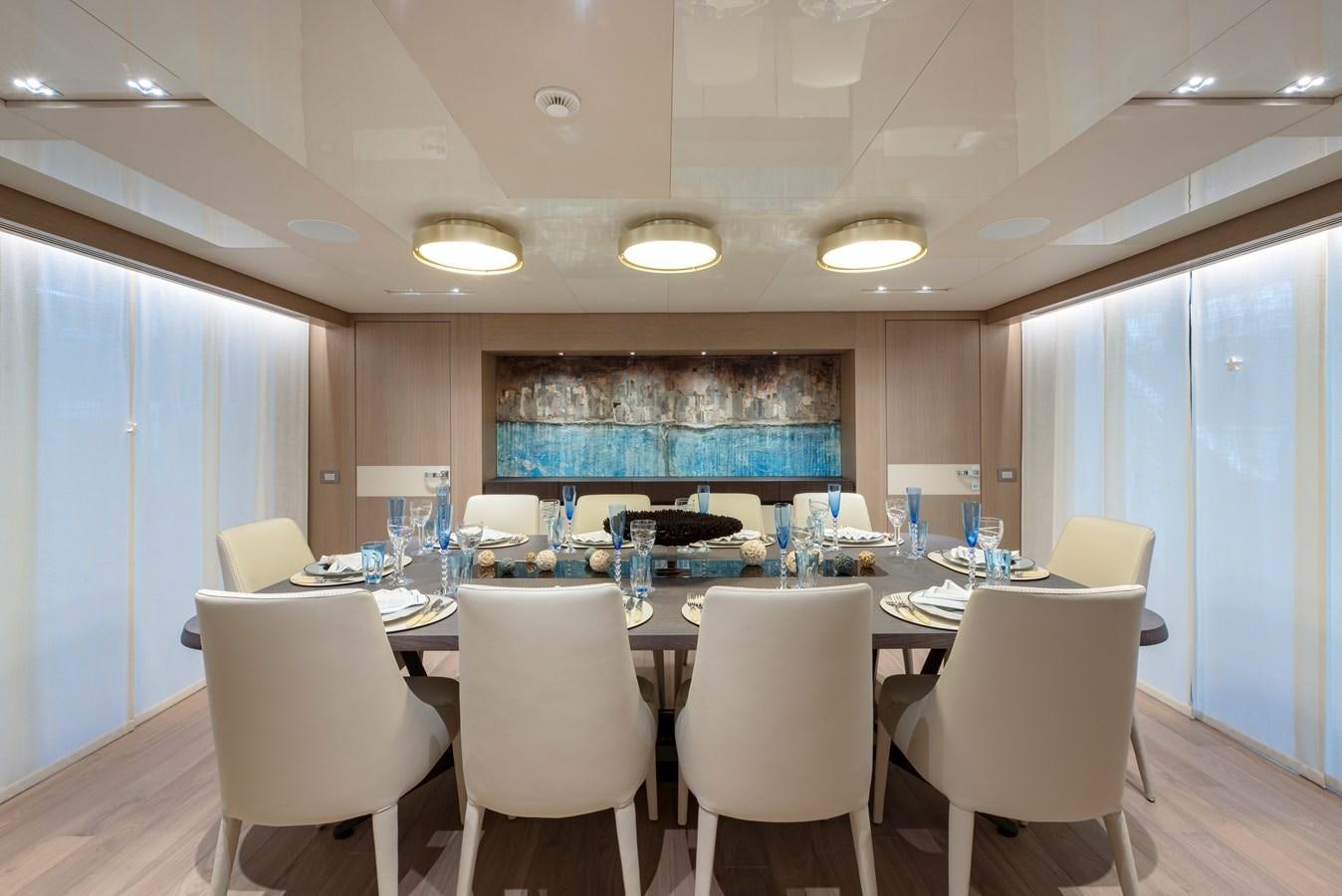 a conference room with a table and chairs aboard INSIEME Yacht for Sale