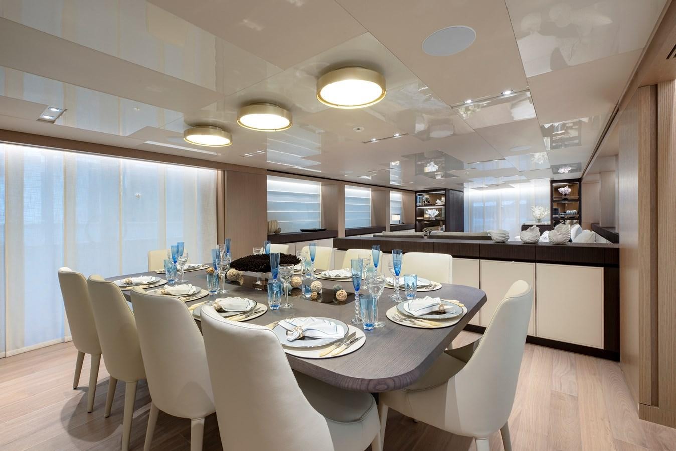 a large dining room table aboard INSIEME Yacht for Sale