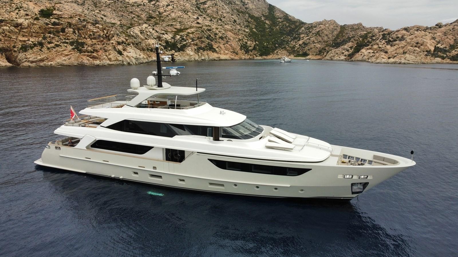 a white yacht in the water aboard INSIEME Yacht for Sale