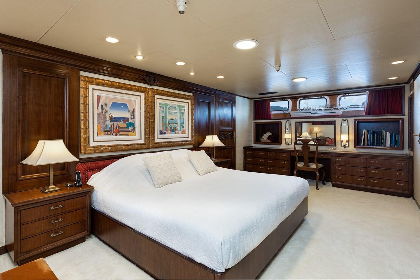 a large bedroom with a large bed aboard GIN TONIC Yacht for Sale