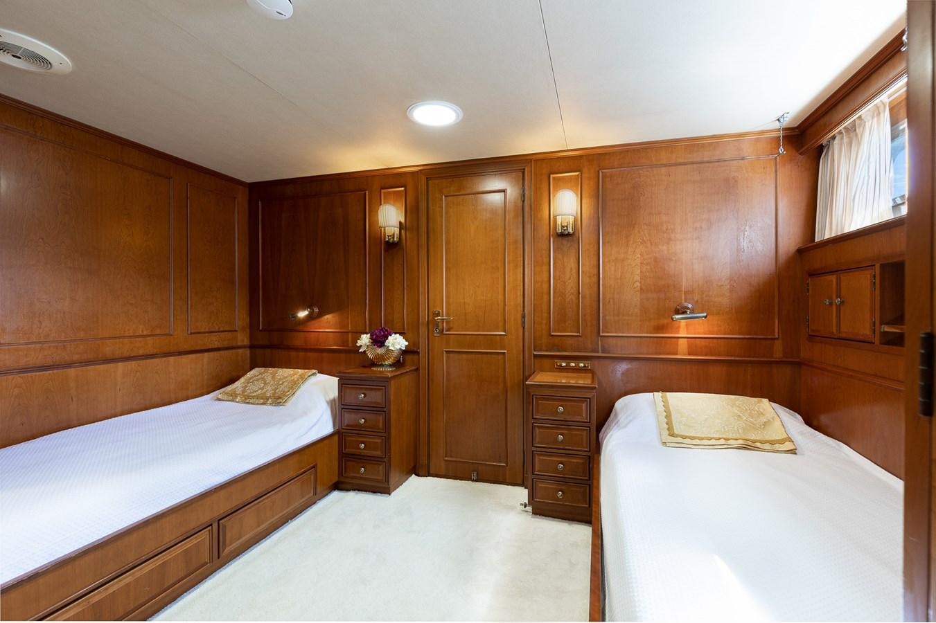 a room with wooden cabinets aboard GIN TONIC Yacht for Sale