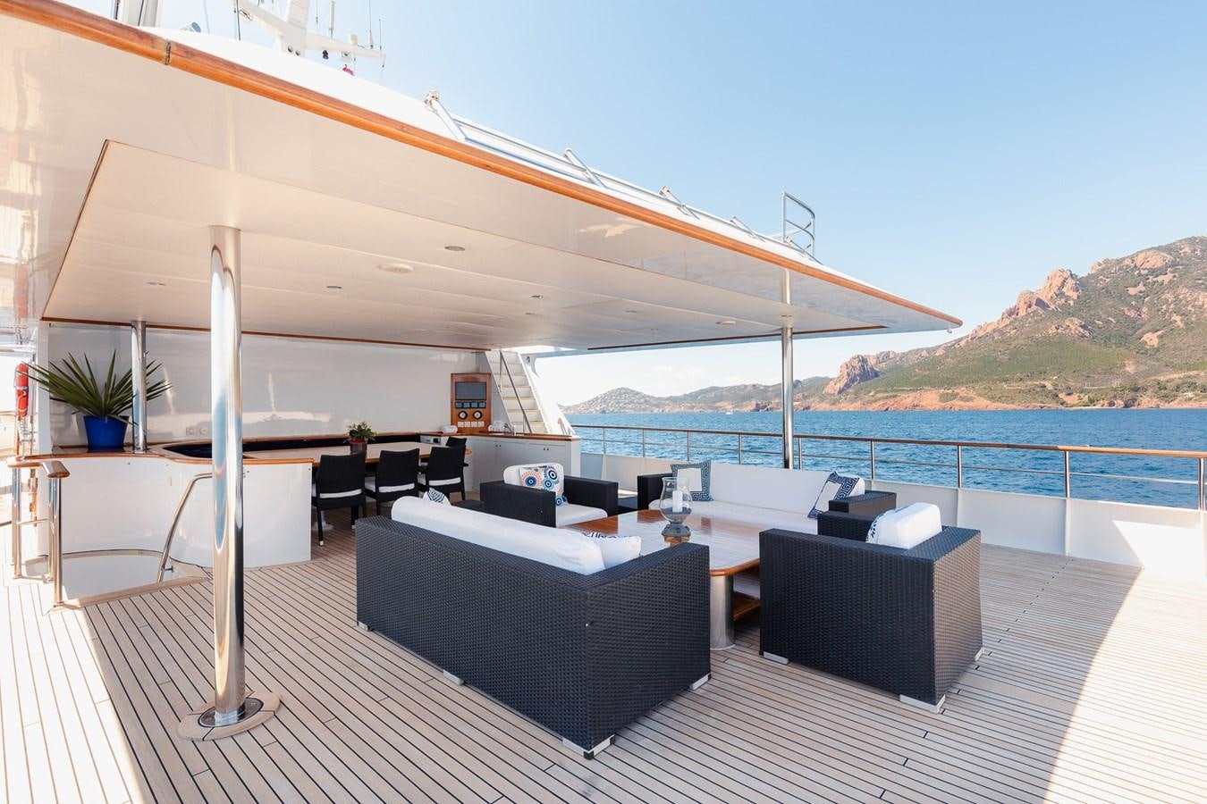 a large patio with a large deck and a large body of water aboard GIN TONIC Yacht for Sale
