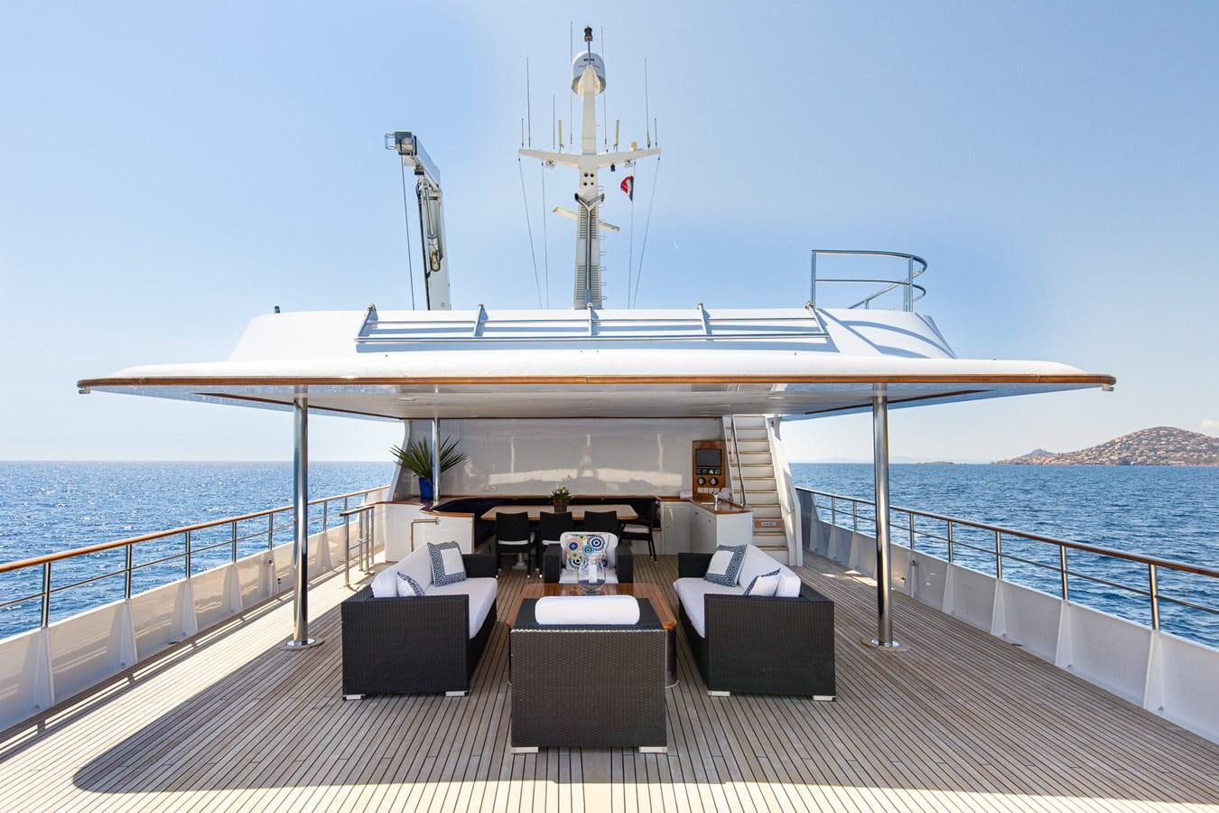 a large ship on a body of water aboard GIN TONIC Yacht for Sale