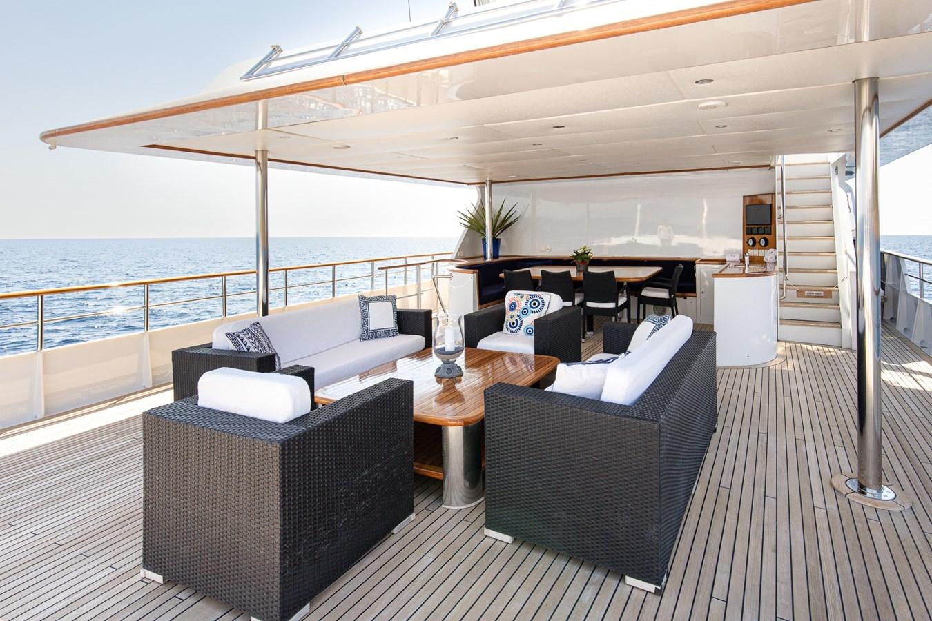a large living room with a large balcony aboard GIN TONIC Yacht for Sale