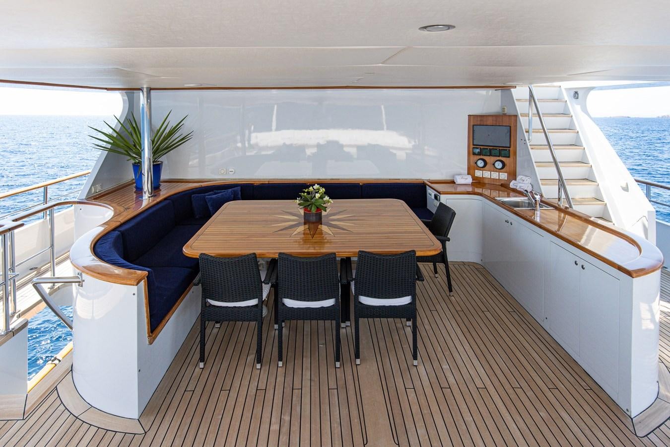 a dining table on a boat aboard GIN TONIC Yacht for Sale
