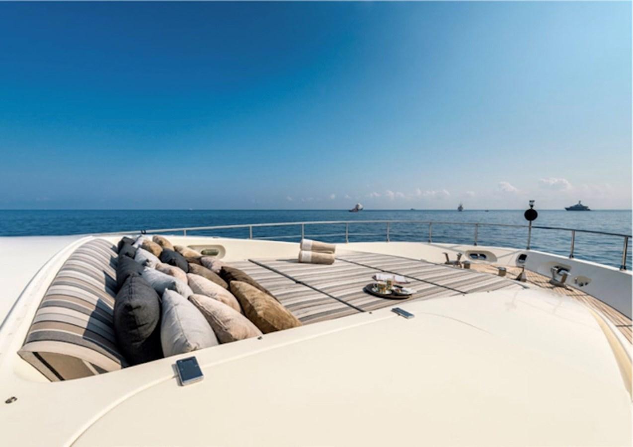 a roof with a building and a body of water in the background aboard LEOPARD 27M Yacht for Sale