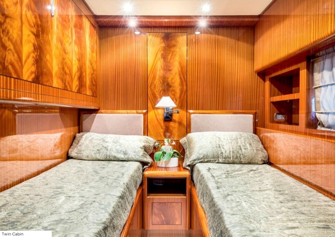 a room with two beds aboard LEOPARD 27M Yacht for Sale
