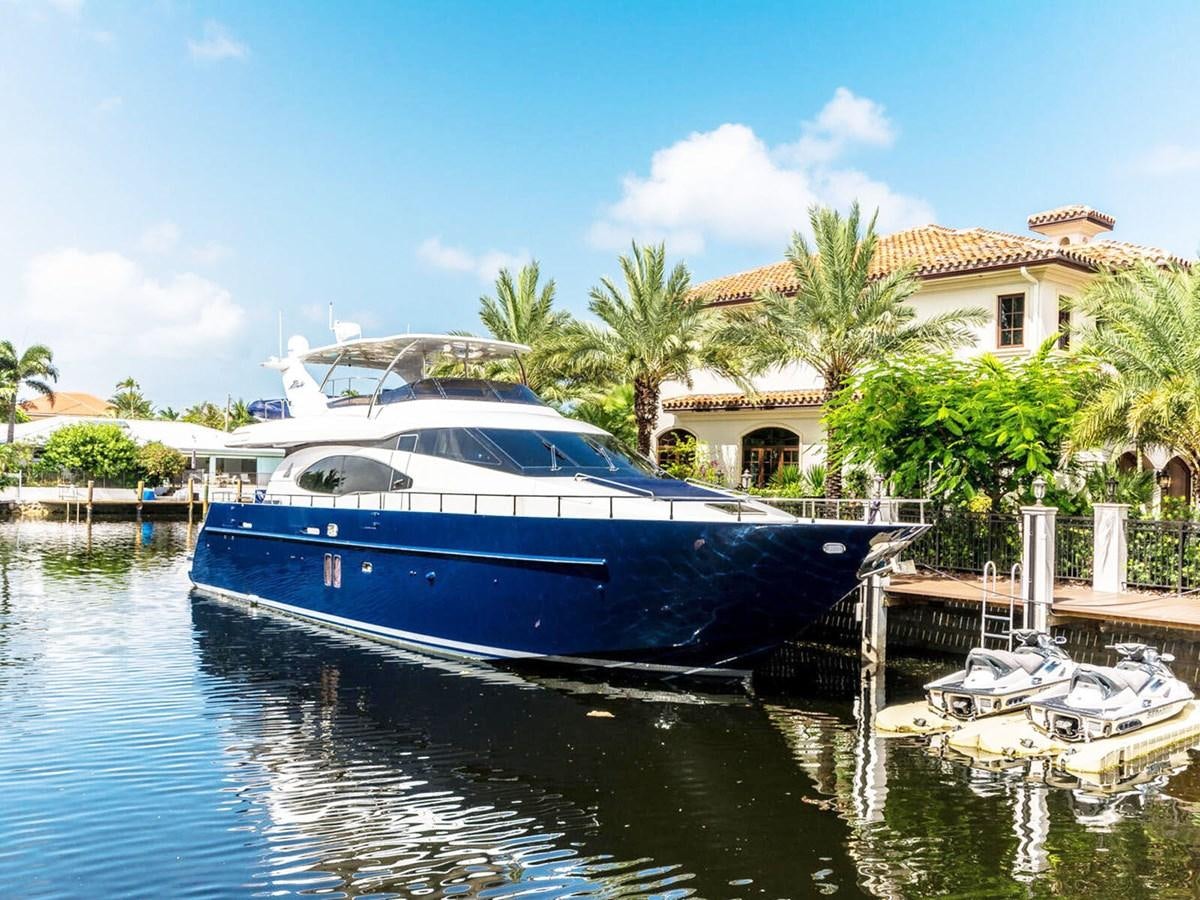 a boat docked at a pier aboard NUEVA OLA Yacht for Sale