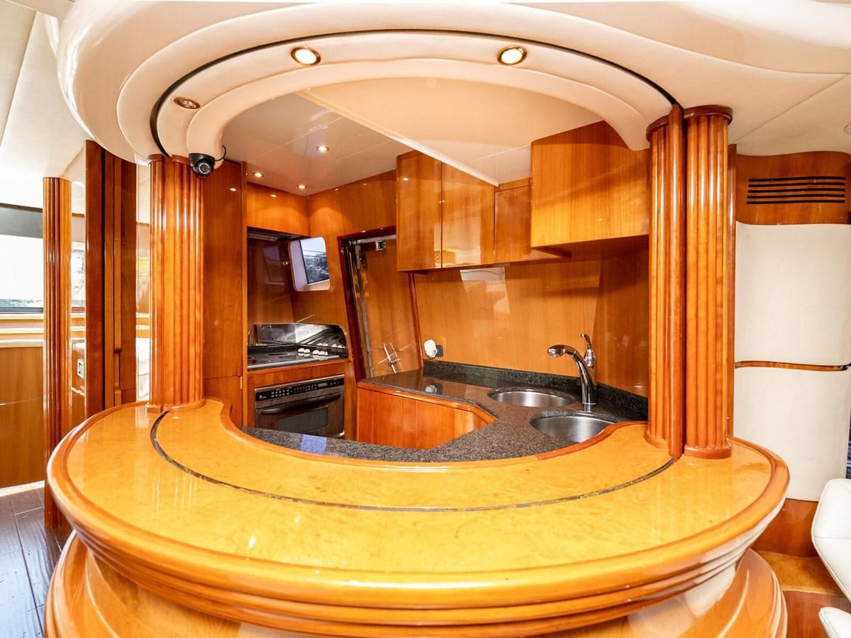 a kitchen with a large marble counter aboard NUEVA OLA Yacht for Sale