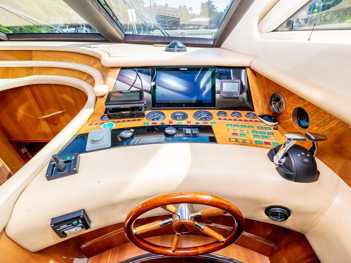the inside of a car aboard NUEVA OLA Yacht for Sale