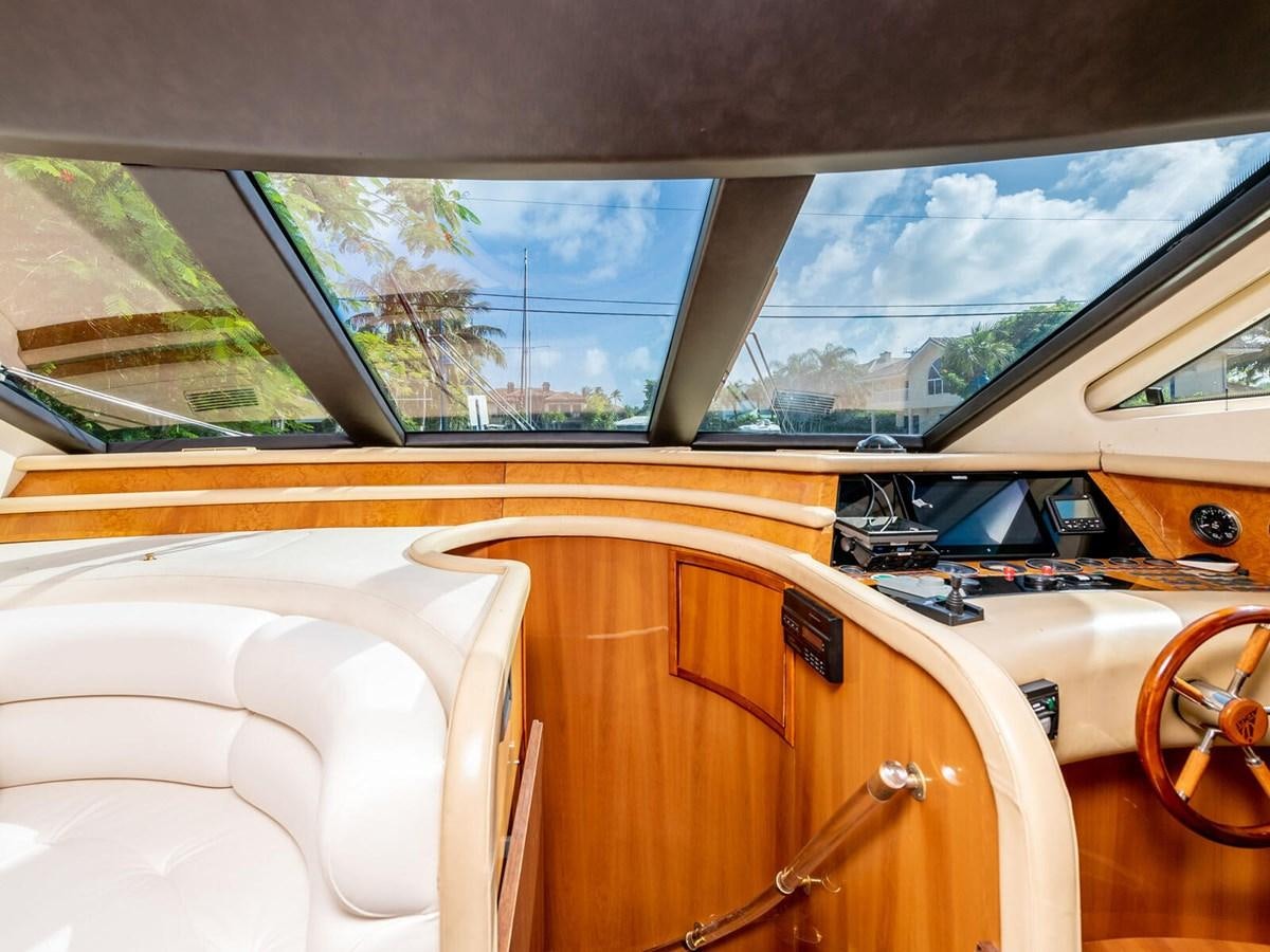 the inside of a car aboard NUEVA OLA Yacht for Sale