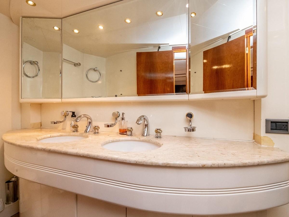 a bathroom with two sinks aboard NUEVA OLA Yacht for Sale