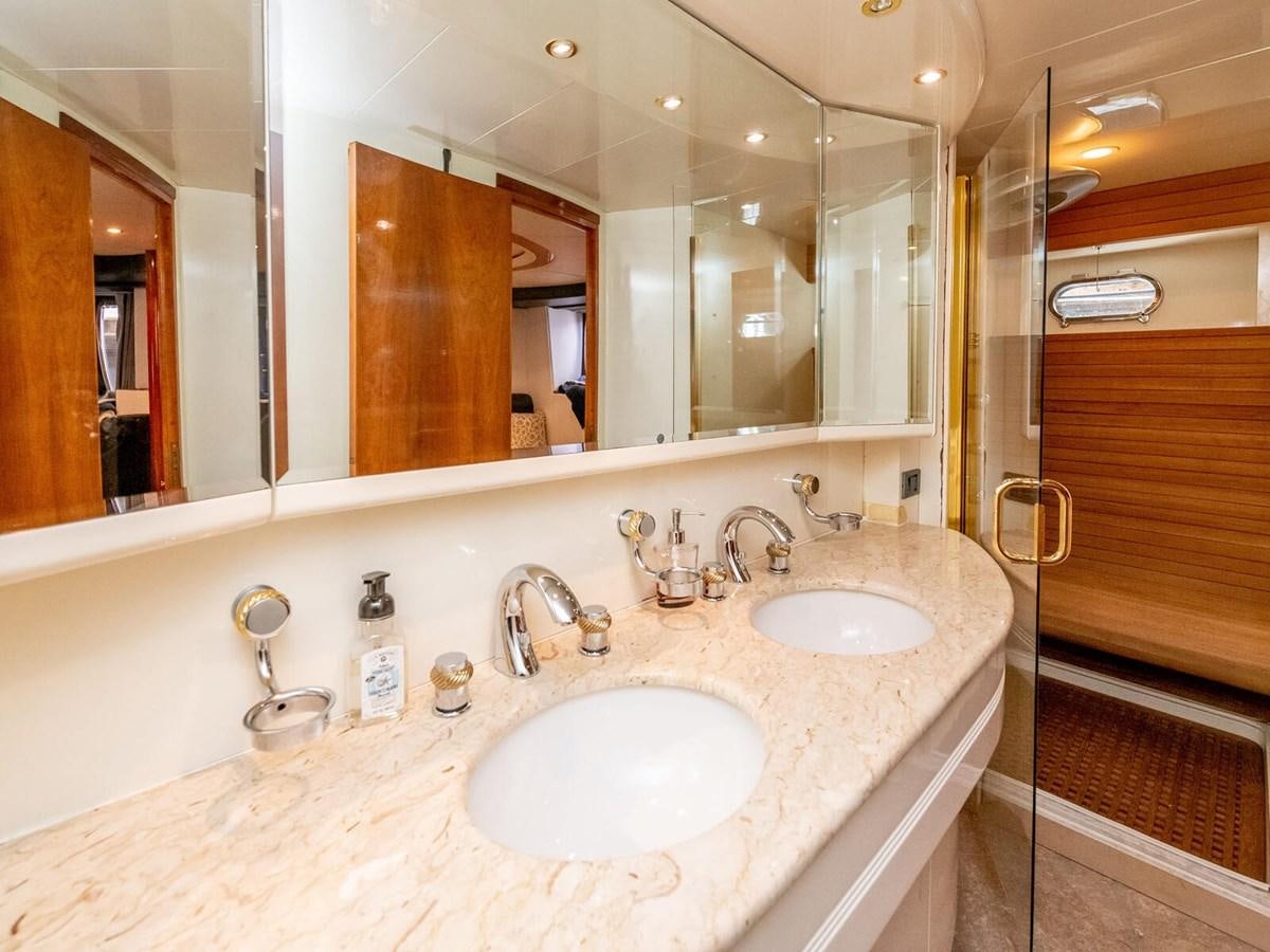 a bathroom with two sinks aboard NUEVA OLA Yacht for Sale