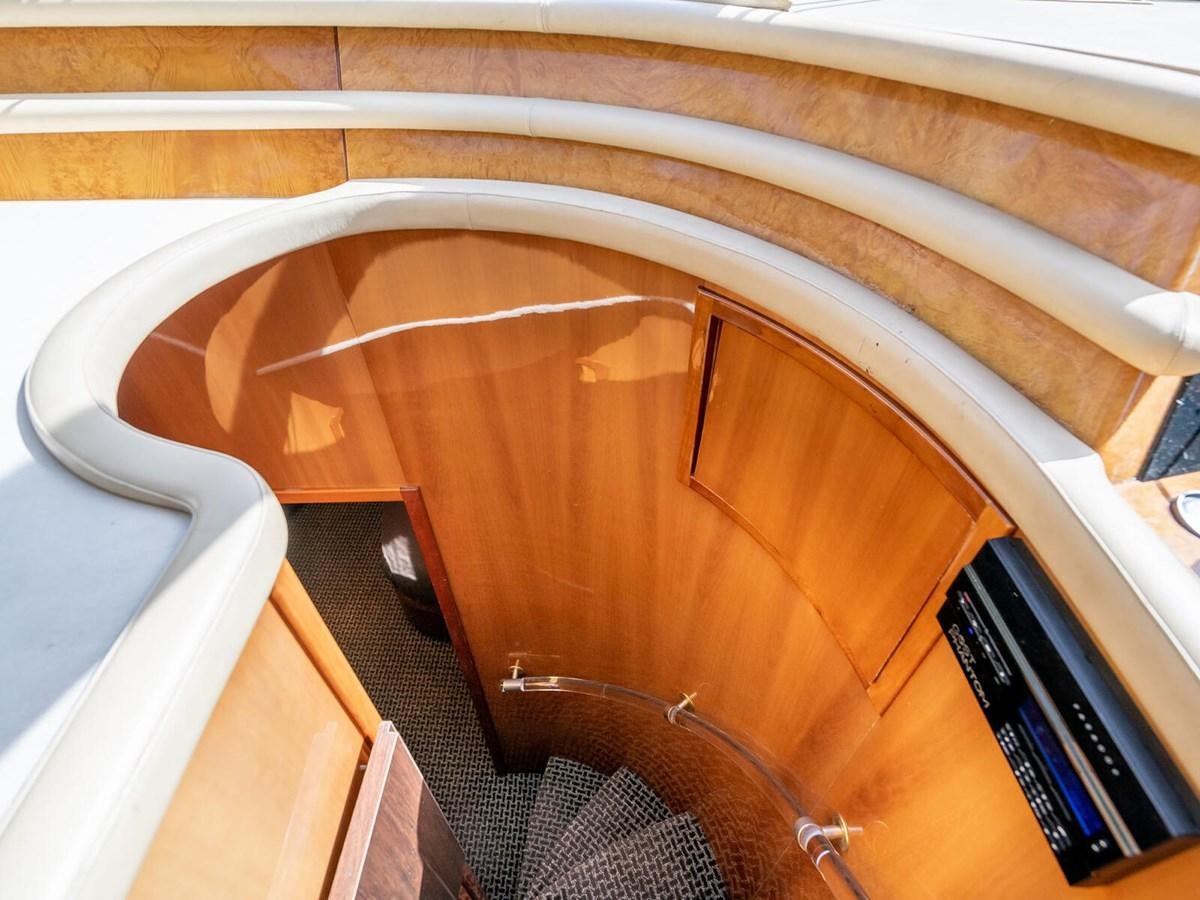 a wooden cabinet with a vent aboard NUEVA OLA Yacht for Sale