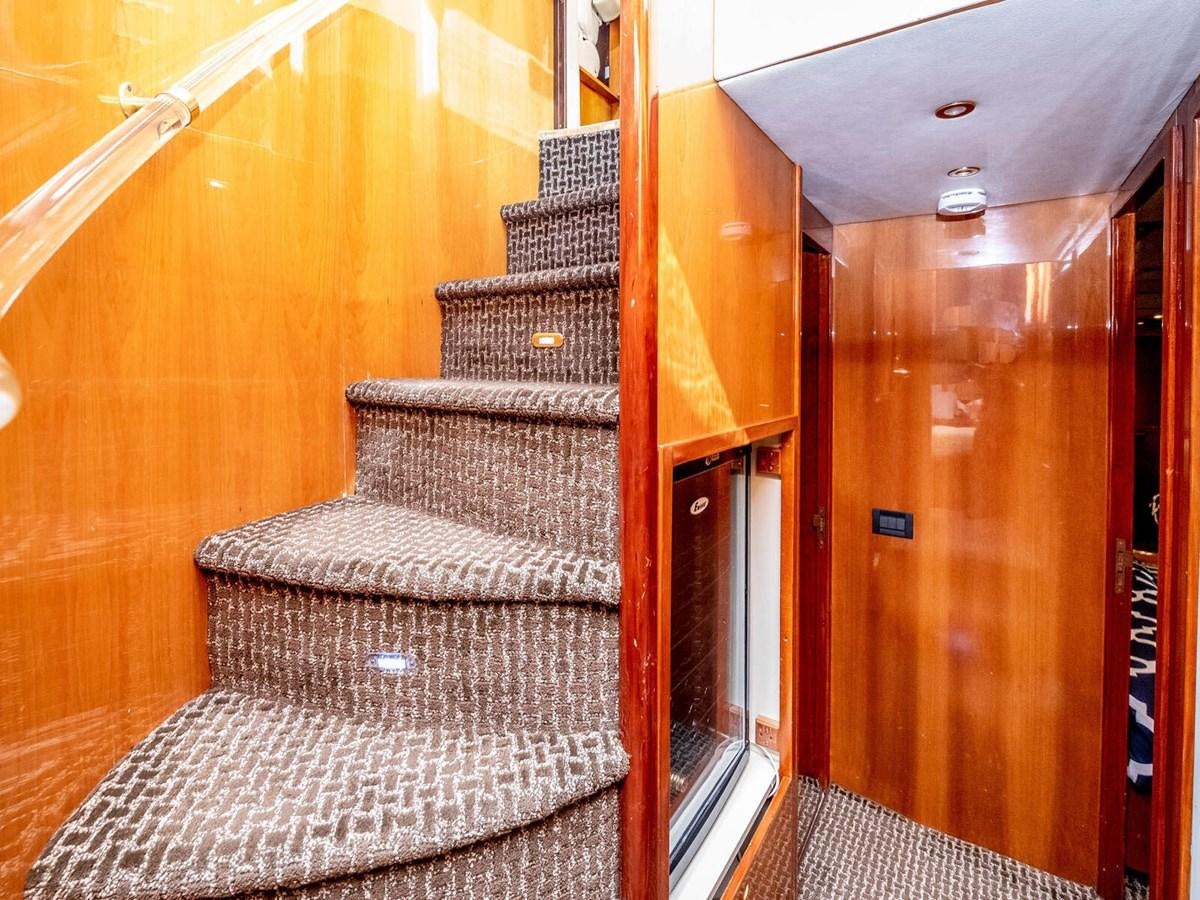 a chair in a room aboard NUEVA OLA Yacht for Sale