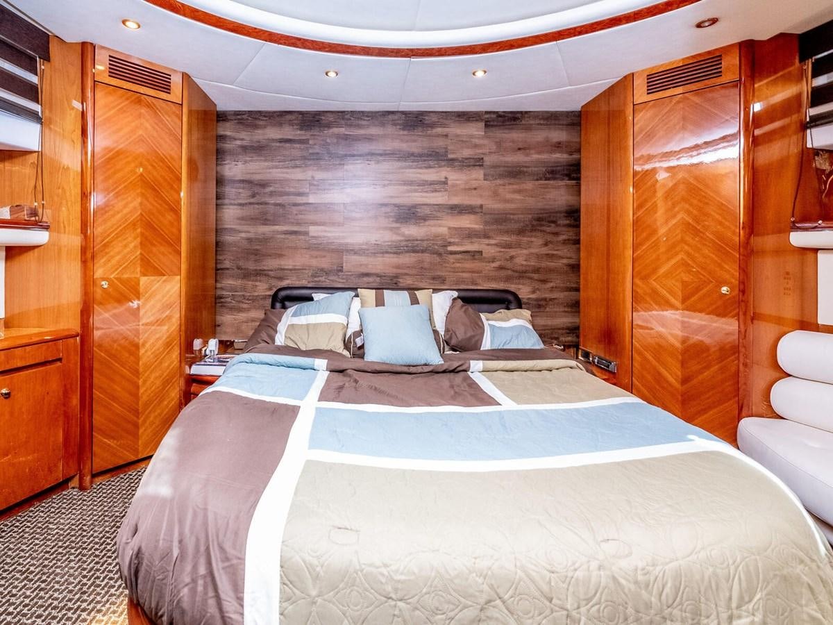 a bed in a room aboard NUEVA OLA Yacht for Sale