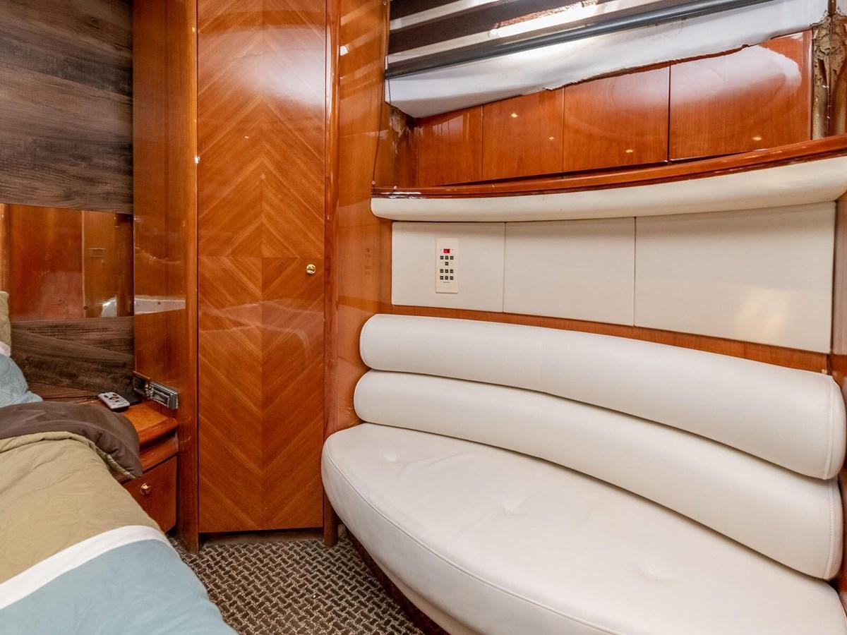 a room with a wood door aboard NUEVA OLA Yacht for Sale
