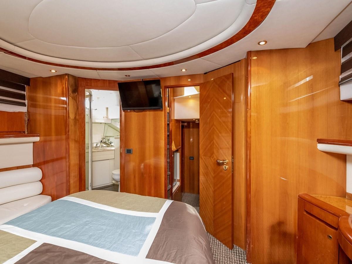 a bedroom with a bed aboard NUEVA OLA Yacht for Sale