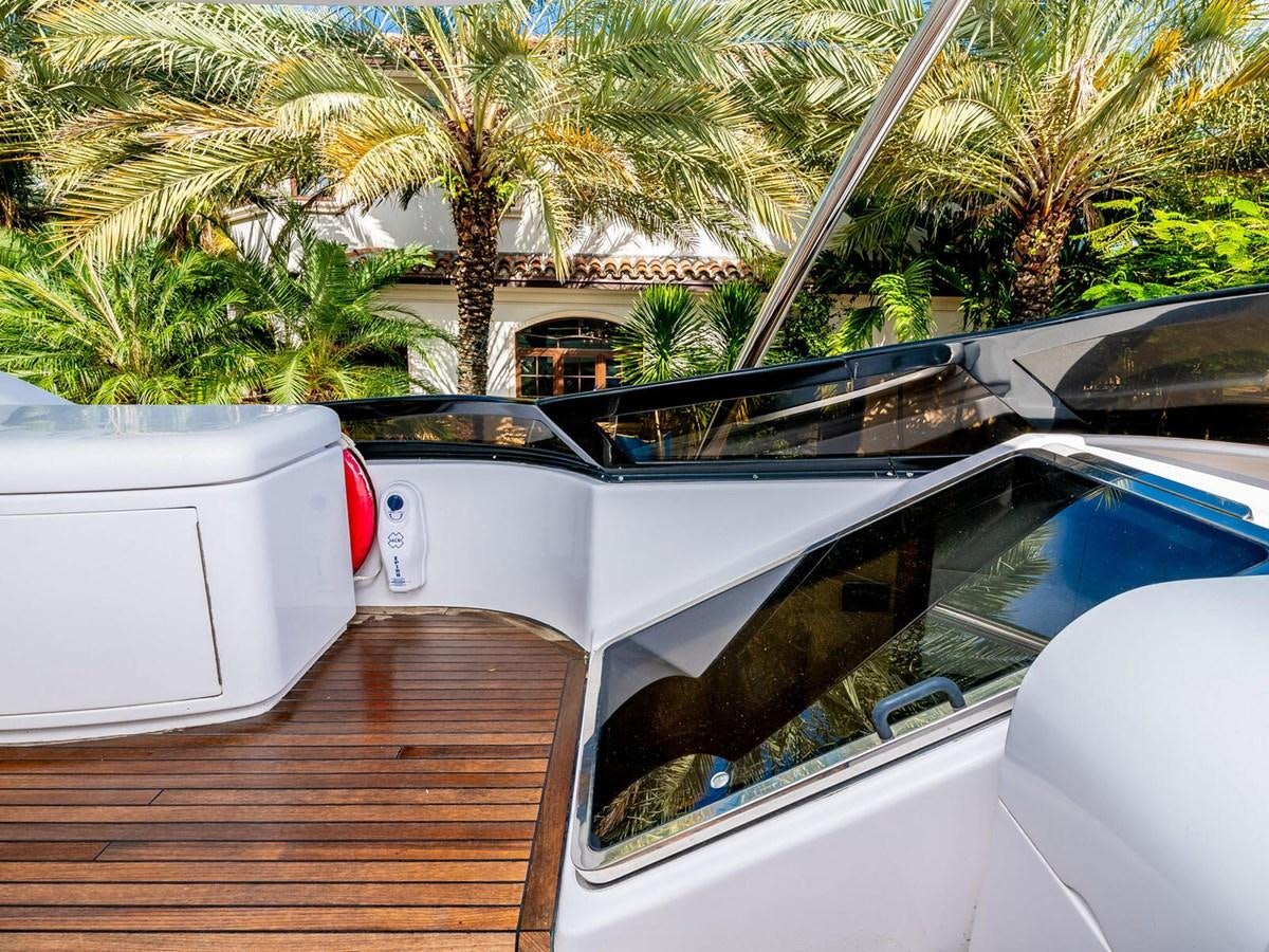 a white car with a tree in the back aboard NUEVA OLA Yacht for Sale