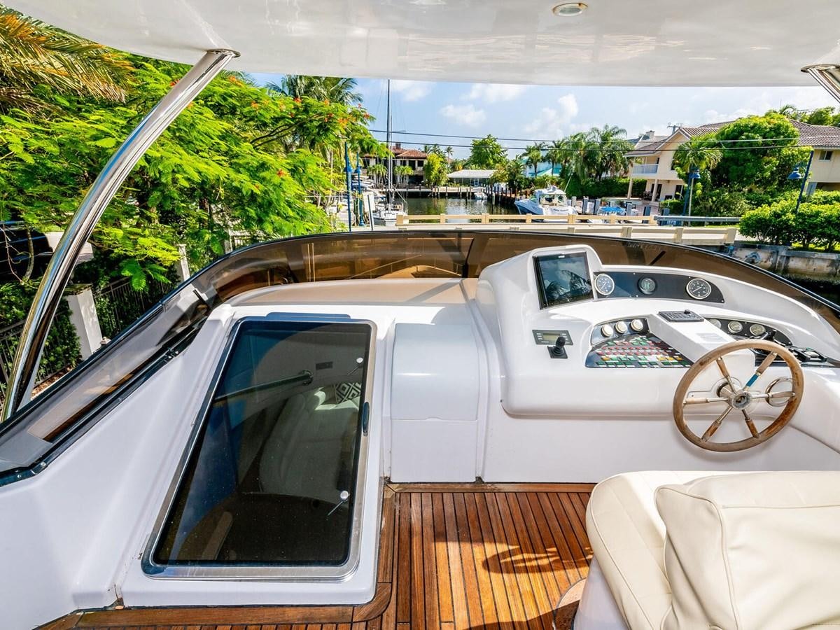 a car with a bicycle on the front aboard NUEVA OLA Yacht for Sale