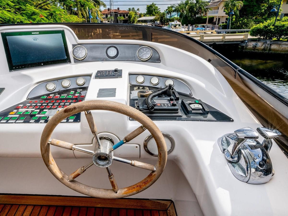 the inside of a car aboard NUEVA OLA Yacht for Sale